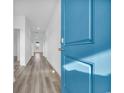 Bright entryway featuring beautiful floors and a blue front door at 234 Letha Dr, Longs, SC 29568