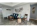 Cozy living room featuring coastal-themed decor and comfortable seating, perfect for relaxation and entertaining at 4714 Woodland St., North Myrtle Beach, SC 29582