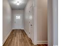 Light and airy entryway with wood-look flooring and neutral walls at 4983 Dupont Rd., Conway, SC 29526