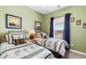 Two twin beds in a well-lit bedroom at 5750 Oyster Catcher Dr. # 131, North Myrtle Beach, SC 29582