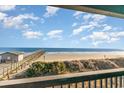 Ocean view from balcony; pier and beach visible at 6000 N Ocean Blvd. # 205, North Myrtle Beach, SC 29582