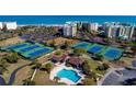 Tennis courts, pool, and clubhouse at 601 Retreat Beach Circle # 328, Litchfield, SC 29585