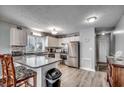 Modern kitchen with granite counters and stainless steel appliances at 612 S Ocean Blvd. # 104A, Surfside Beach, SC 29575