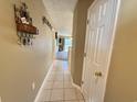 Bright hallway with tile flooring and access to other rooms at 636 Waterway Village Blvd. # 17C, Myrtle Beach, SC 29579