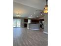 Open concept kitchen with granite countertops and stainless steel appliances at Tbb14 Casey Dr., Green Sea, SC 29545