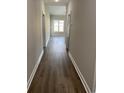 Long hallway with light brown wood flooring at Tbd 13 Casey Dr., Green Sea, SC 29545