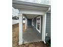 Covered back porch with white columns and gray siding at 1028 Seaside Dr., North Myrtle Beach, SC 29582