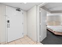 White door entryway to bedroom with tiled floor at 1501 S Ocean Blvd. # 846, Myrtle Beach, SC 29577