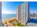Beautiful ocean view overlooking beach, pools and neighboring hotel at 1501 S Ocean Blvd. S # 1450, Myrtle Beach, SC 29577