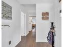 Bright and airy hallway with wood flooring and access to other rooms at 1870 Auburn Ln. # 21J, Surfside Beach, SC 29575