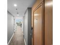 Modern condo hallway with light wood floors at 2301 S Ocean Blvd. # 1101, North Myrtle Beach, SC 29582