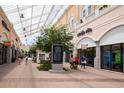 Outdoor shopping center with various stores and people walking around at 467 Ribbon Rail Way, Loris, SC 29569