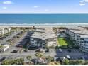 Aerial view of oceanfront condo building and surrounding area at 5601 North Ocean Blvd. # B-312, Myrtle Beach, SC 29577