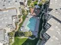 Community pool surrounded by lush landscaping at 5601 North Ocean Blvd. # B-312, Myrtle Beach, SC 29577
