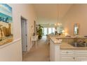 Kitchen with granite countertop and white cabinets at 601 N Hillside Dr. # 3634, North Myrtle Beach, SC 29582