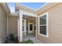 Front entry of home with covered walkway and columns at 779 Salerno Circle # 1202 - B, Myrtle Beach, SC 29579