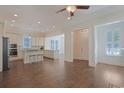 Open concept kitchen with island, stainless steel appliances, and hardwood floors at 822 Farrow Pkwy., Myrtle Beach, SC 29577