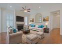 Spacious living room with hardwood floors, fireplace, and comfortable seating at 822 Farrow Pkwy., Myrtle Beach, SC 29577