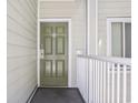 Front door to condo unit featuring a door with seashell decoration at 9400 Shore Dr. # 311, Myrtle Beach, SC 29572