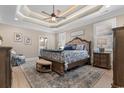 Large main bedroom with a king-size bed and en-suite bathroom at 1853 Wood Stork Dr., Conway, SC 29526