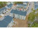 Aerial view showcasing a neighborhood with modern townhomes, green spaces, and well-organized street layouts at 200 Yam Dr. # D, Myrtle Beach, SC 29579