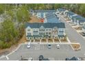 Aerial view of modern townhomes with well-maintained landscaping, ample parking, and convenient community layout at 200 Yam Dr. # D, Myrtle Beach, SC 29579