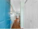 Bright entryway with hardwood floors and built-in shelving at 212-C Landing Rd. # 212-C, North Myrtle Beach, SC 29582