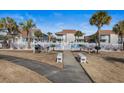 Community pool with grills and seating area at 300 Shorehaven Dr. # W-4, North Myrtle Beach, SC 29582