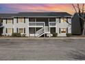Two-story building with multiple units, balconies, and parking lot at 3555 Highway 544 # 2C, Conway, SC 29526