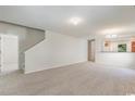 Spacious living room with neutral carpeting and an open floor plan at 396 Bellegrove Dr., Myrtle Beach, SC 29579