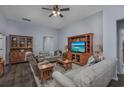 Spacious living room featuring hardwood floors and ample natural light at 440 Craigflower Ct., Longs, SC 29568