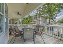 Relaxing deck with seating area and view of surrounding homes at 6001-1830A S Kings Highway, Myrtle Beach, SC 29575