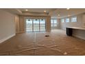 Bright living room features sliding glass doors, recessed lighting, and neutral paint at 1121 Oxeye St., North Myrtle Beach, SC 29582