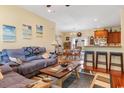 Cozy living room leading into a bright dining area with hardwood floors at 1425 Tiger Grand Dr., Conway, SC 29526