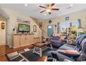 Comfortable living room featuring a large entertainment center and natural light at 1425 Tiger Grand Dr., Conway, SC 29526