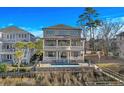 Luxury home boasts a private pool and beautiful landscaping at 1601 Waterway Dr., North Myrtle Beach, SC 29582