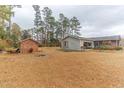 Large backyard with shed, firepit, and patio at 1901 Harris Short Cut Rd., Conway, SC 29526