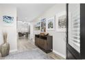 Welcoming foyer with hardwood floors and stylish decor at 3713 Park Pointe Ave., Little River, SC 29566