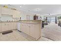 Open kitchen with sleek countertops, modern appliances, and seamless flow into the living area at 4851 Luster Leaf Circle # 302, Myrtle Beach, SC 29577