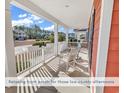 Inviting front porch offers a relaxing space with comfortable seating and charming decor at 644 Serendipity Circle, Murrells Inlet, SC 29576