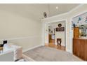 Neutral room with carpet and white trim with an opening to the kitchen area at 799 Helms Way, Conway, SC 29526