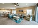 Comfortable living room with plush seating, bright accents, and an open floor plan at 1004 Ray Costin Way # 206, Murrells Inlet, SC 29576