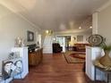 Inviting living room with hardwood floors, fireplace, and cozy seating area at 11 S Beech Ave., Andrews, SC 29510
