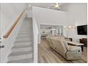 Open-concept living room with high ceilings and natural light at 2449 Campton Loop, Conway, SC 29527