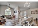 Inviting living room and dining area with vaulted ceilings, comfortable seating, and stylish decor at 4225 Rivergate Ln., Little River, SC 29566