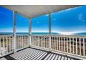 Bright balcony with a view of the ocean at 4800 N Ocean Blvd. # 2-E, North Myrtle Beach, SC 29582