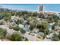 An aerial view that highlights a home's proximity to the beach at 5520 N Kings Hwy., Myrtle Beach, SC 29577