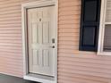 Close-up of unit's front door with complementary shutter on the side at 635 Waterway Village Blvd. # 12-I, Myrtle Beach, SC 29579