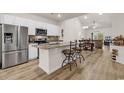 Open kitchen featuring stainless steel appliances, granite countertops, and island with bar seating at 801 San Marco Ct. # C, Myrtle Beach, SC 29579