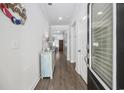 Bright and airy entryway with hardwood floors, and stylish decor, creating a welcoming first impression at 834 Summer Starling Pl., Myrtle Beach, SC 29577